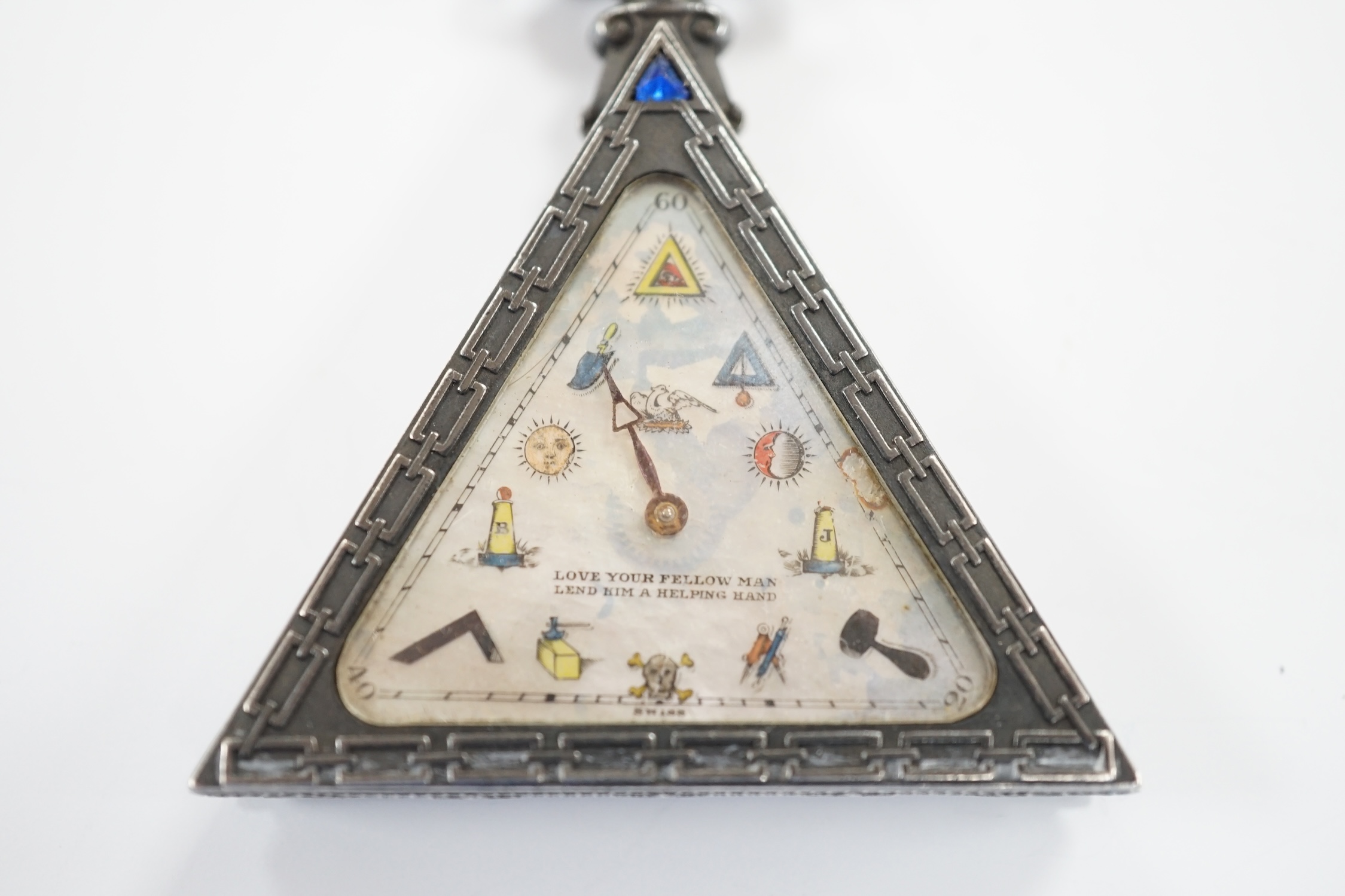 A 1920's Swiss silver triangular Masonic timepiece, with mother of pearl dial, import marks for George Stockwell, London, 1928, 0verall 65mm (lacking minute hand).